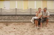 Couple enjoying chips on Fleetwood Beach